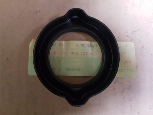 211405127A Cover, torsion arm seal