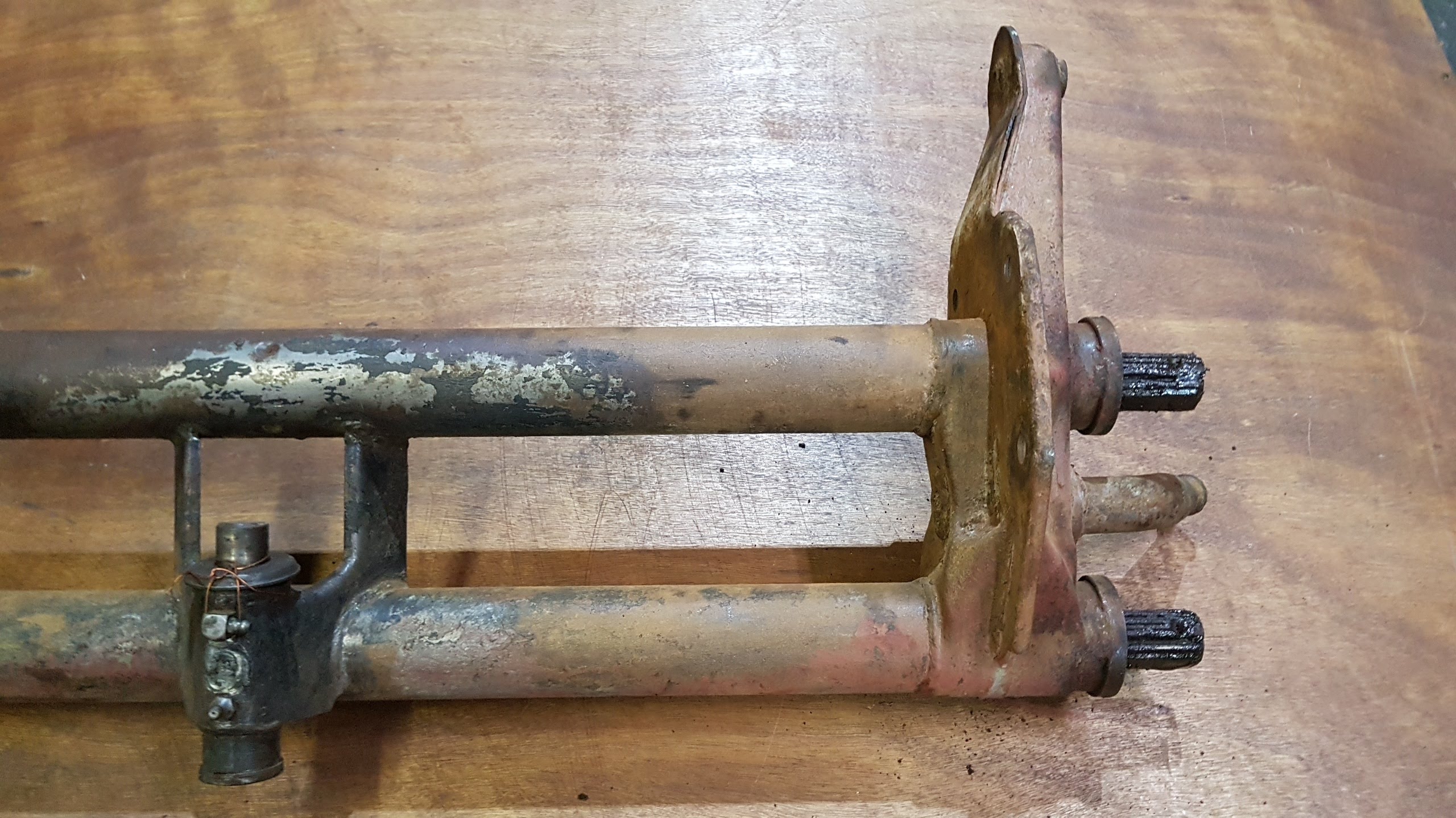(USED) 211 401 061 FS Front axle beam, with torsion springs