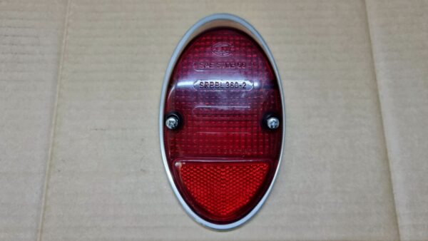 111945241DS Tail light lens with brezzel