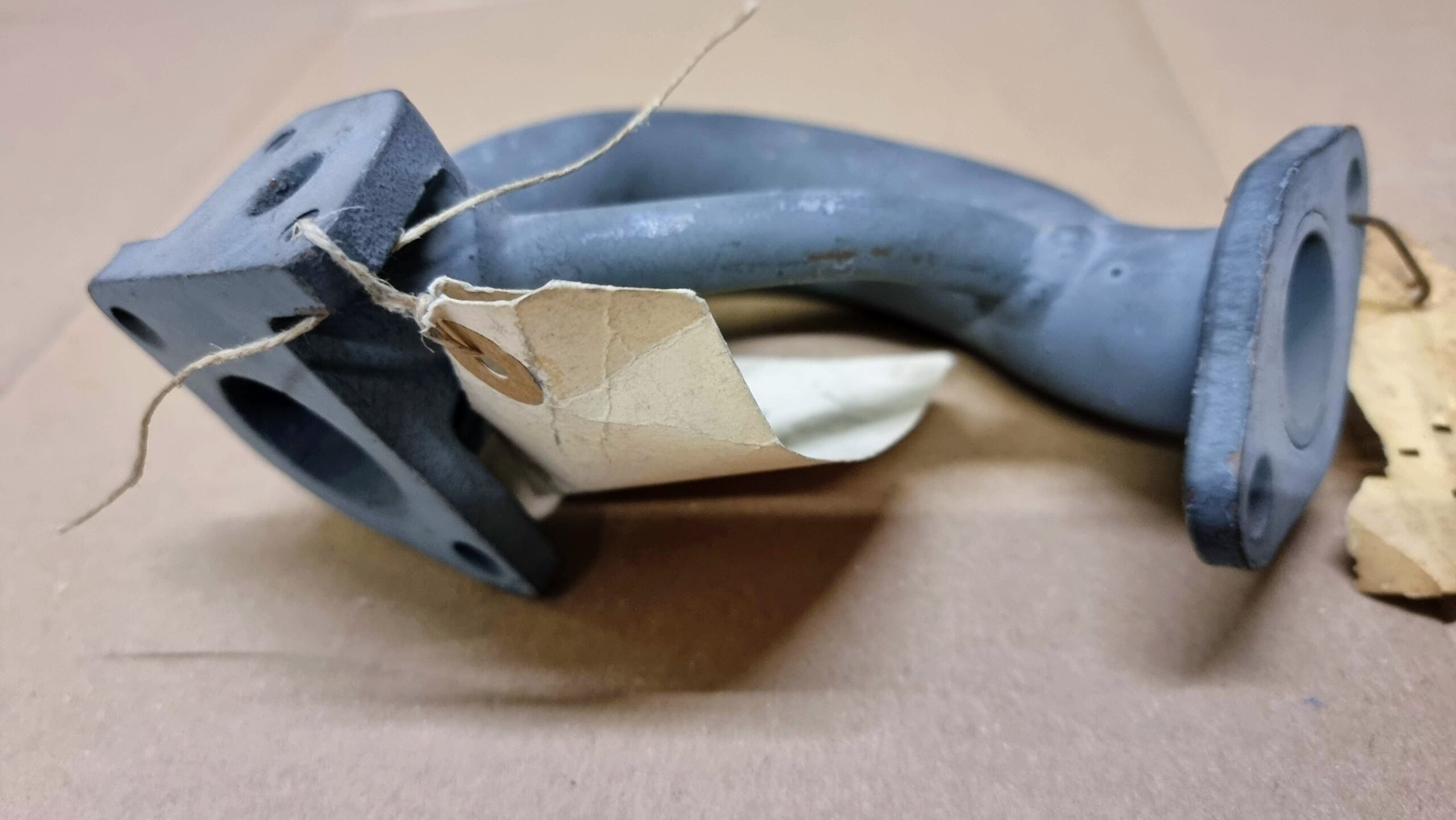 NOS 181251153 Connecting elbow, rear left