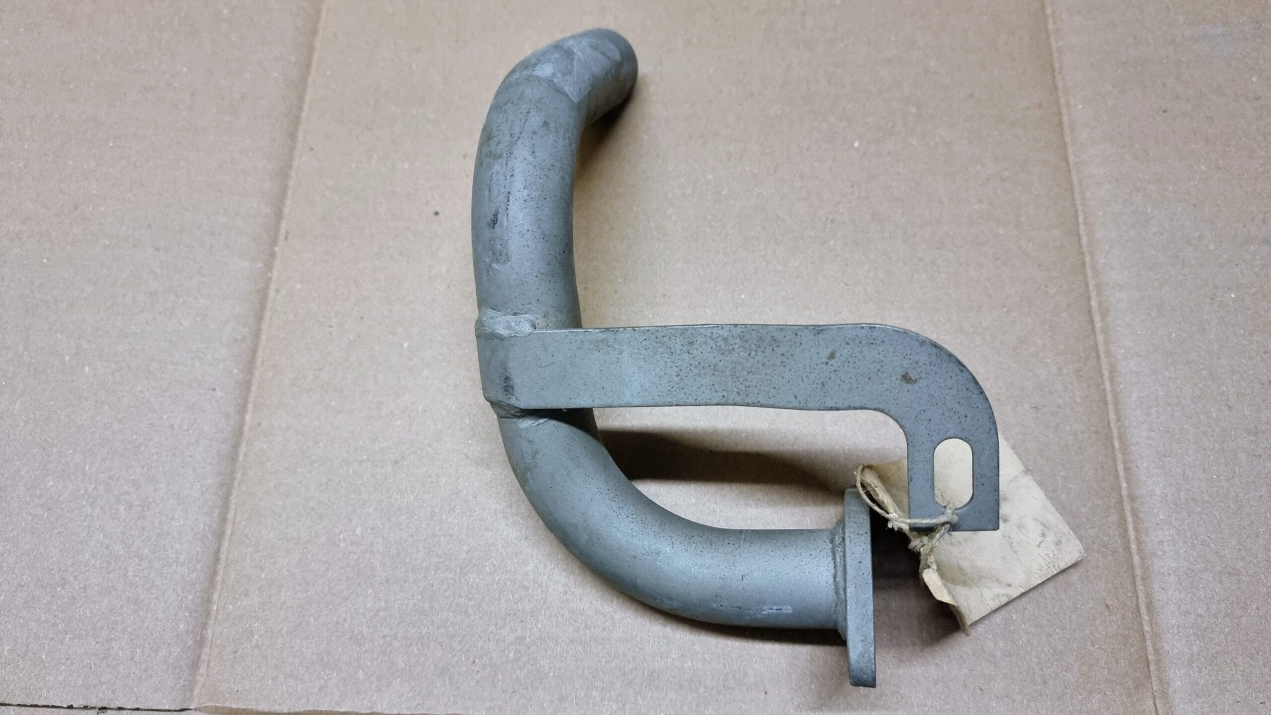 NOS 181251186B Tail pipe, right