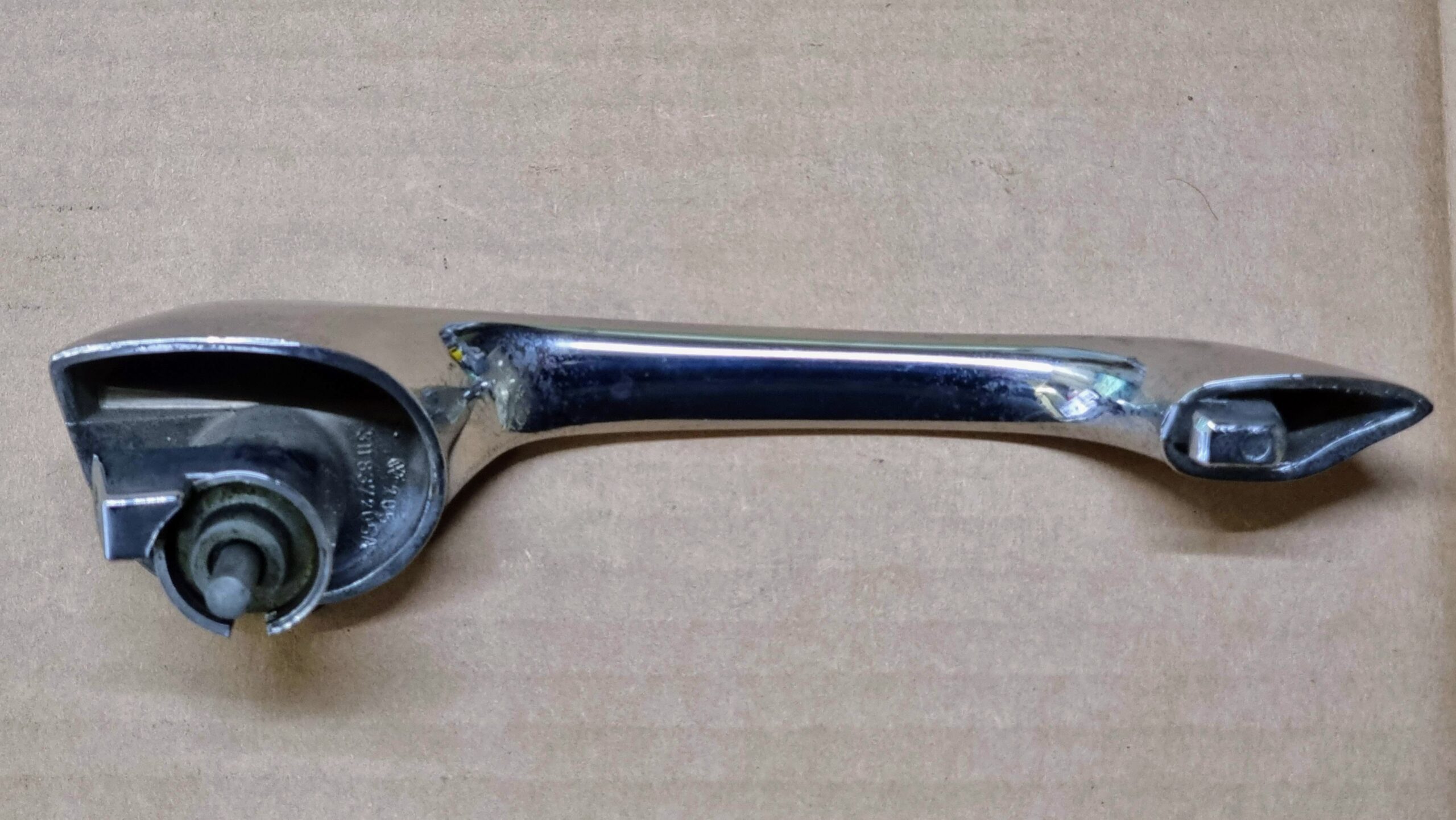 NOS 311837205A Door handle outer, left