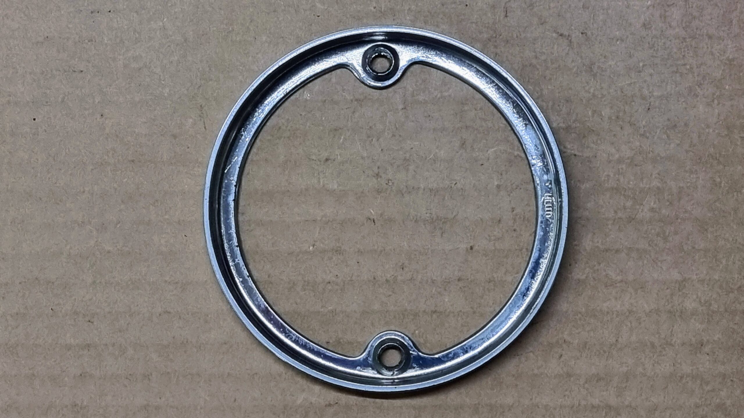 NOS 211945117 Rim for combination stop/tail light, Hella