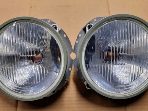 NEW 000941753 Headlamp H4 Hella, pair
