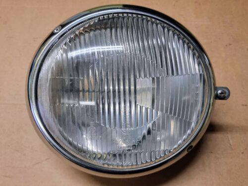 NOS 211941040A Headlamp Bosch, right