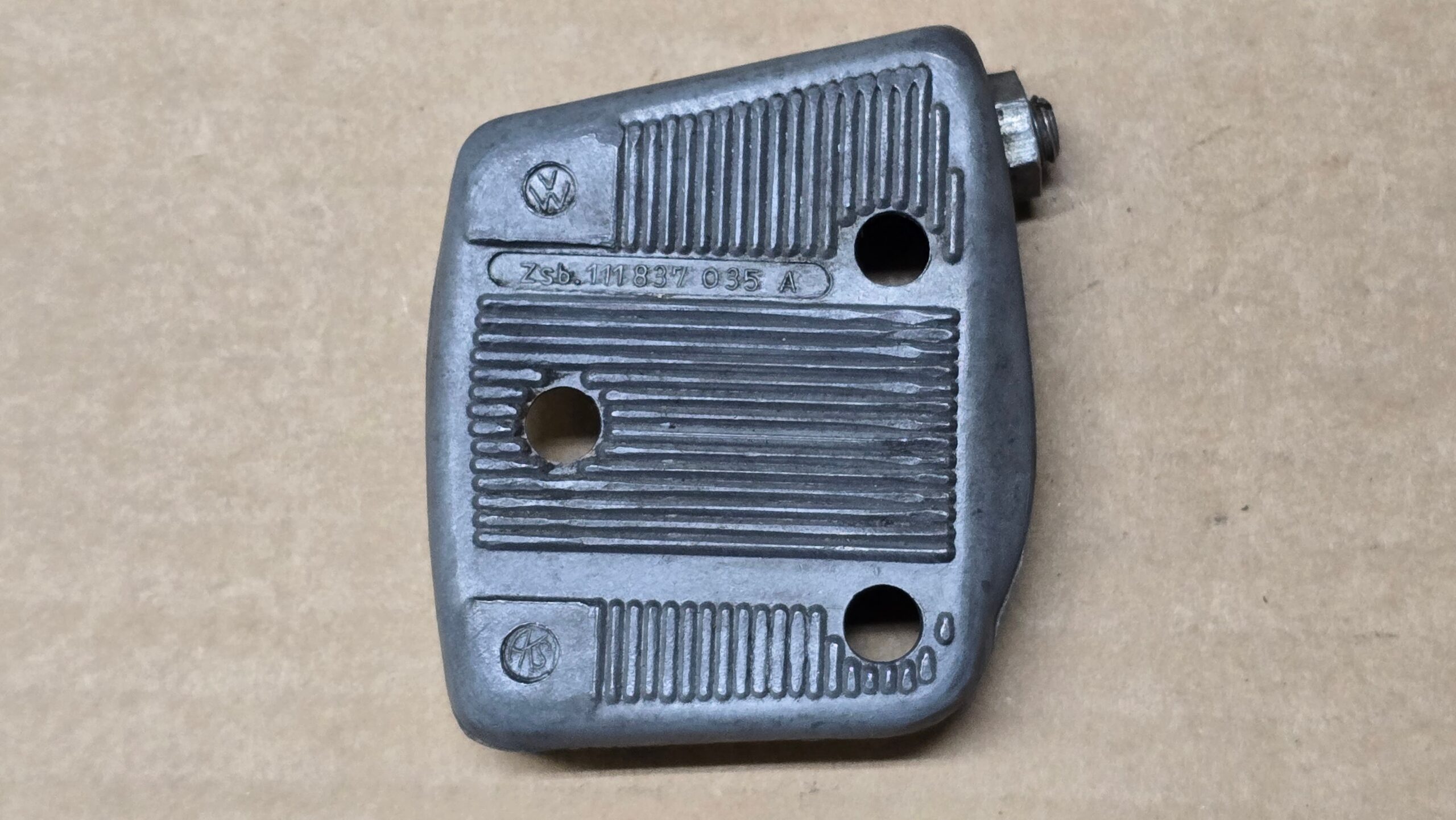 USED 111837035A Striker plate, door lock, left