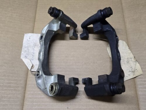 NOS 437615125 Brake carrier, pair